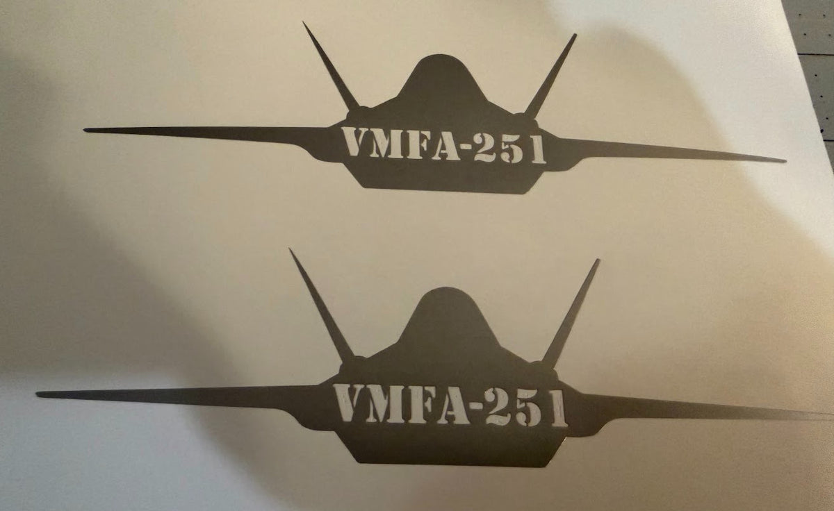 Silver F-35 decal with VMFA-251 cut into the jet, applied to a window